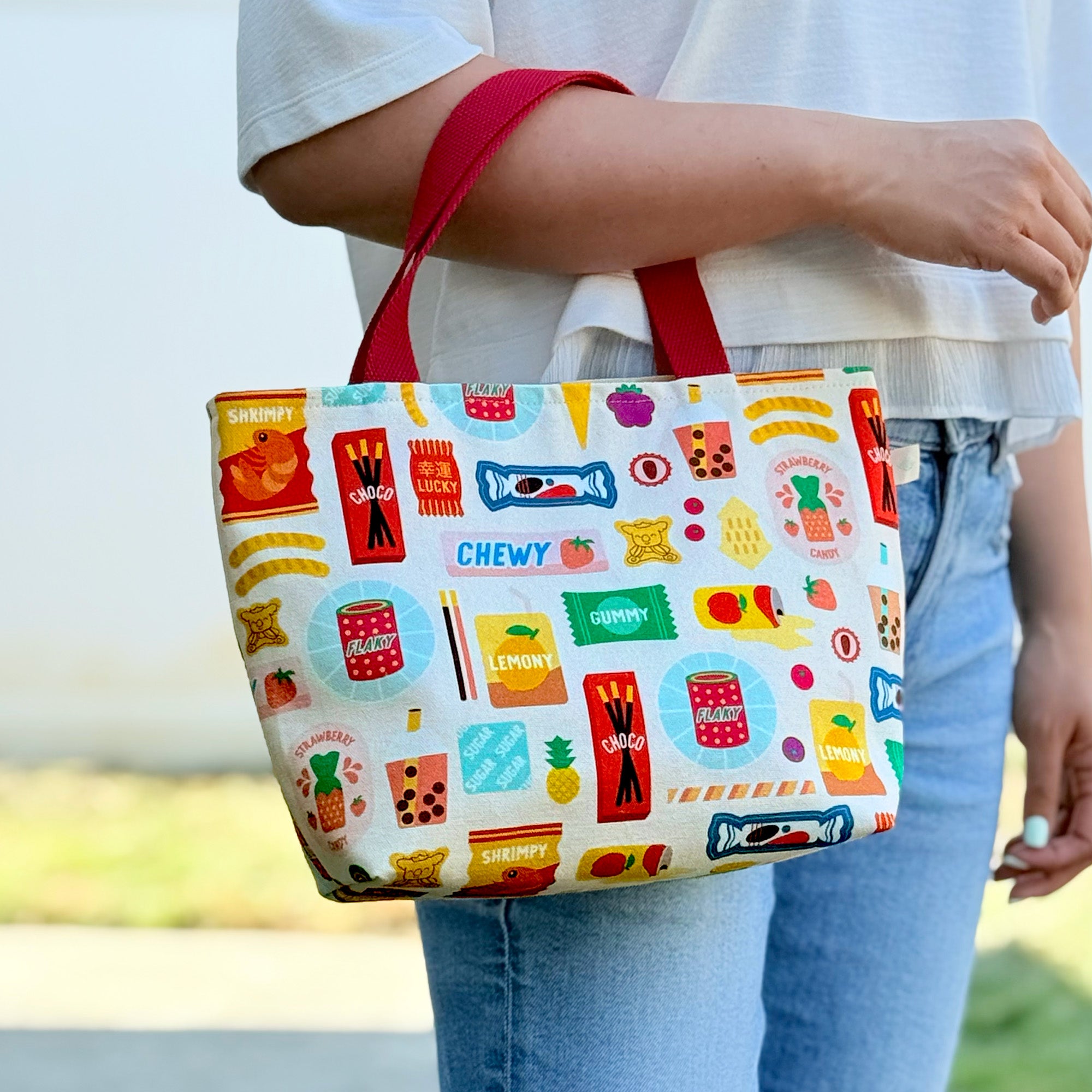 Asian sweets + snacks pattern mini tote bag on arm by I&