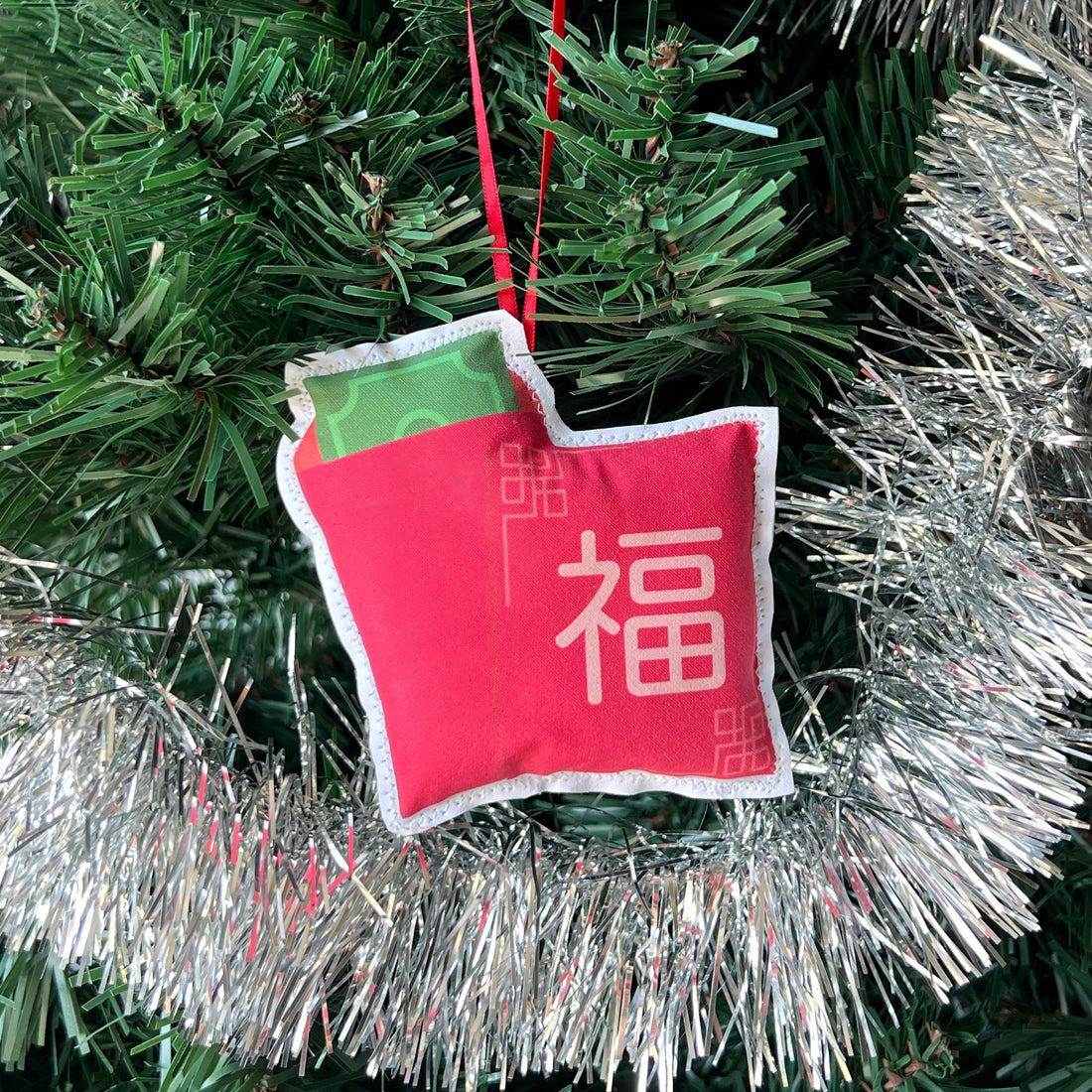 Red pocket plush Christmas ornament by I&