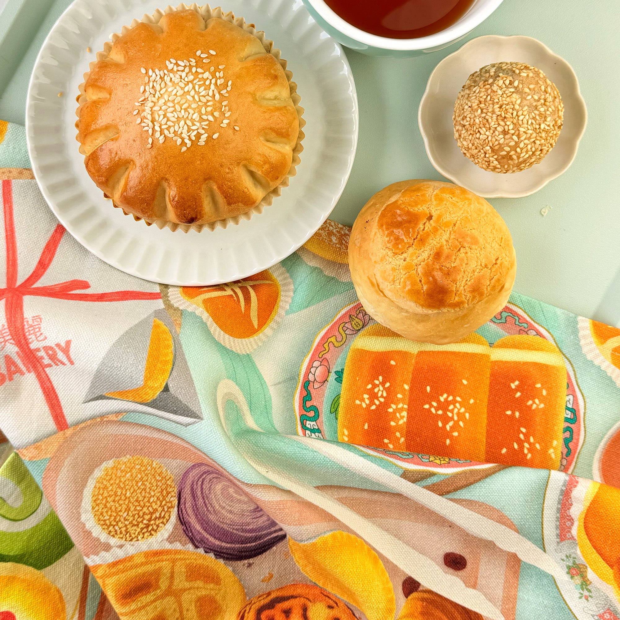 Tea towel with Chinese bakery pastries printed illustration by I&